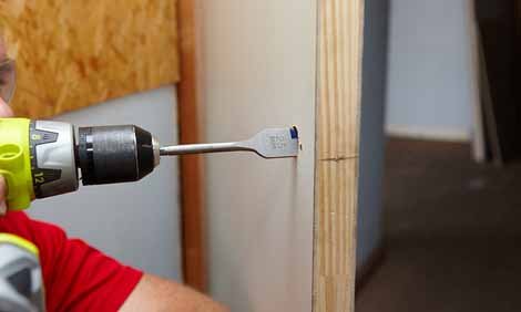 Installation de poignée de porte en acier inoxydable